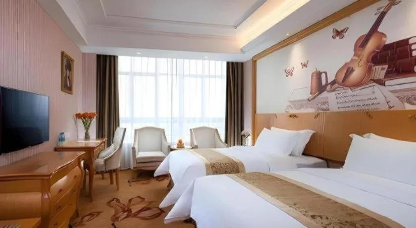 Bed in Vienna Hotel Guangdong Boluo Fu Mountain Scenic Spot
