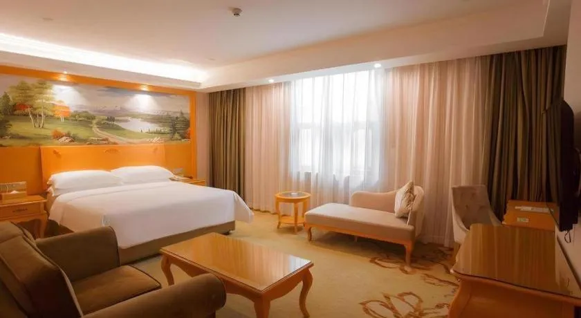 Bed in Vienna Hotel Guangdong Boluo Fu Mountain Scenic Spot
