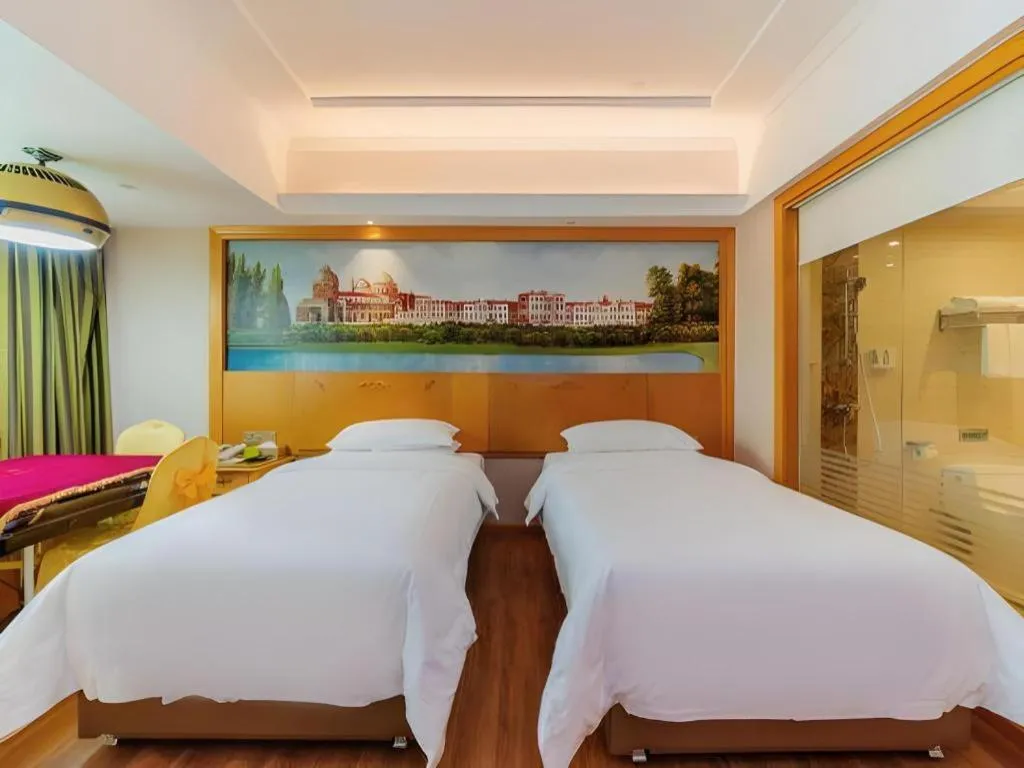 Bed in Vienna Hotel Guangdong Boluo Fu Mountain Scenic Spot