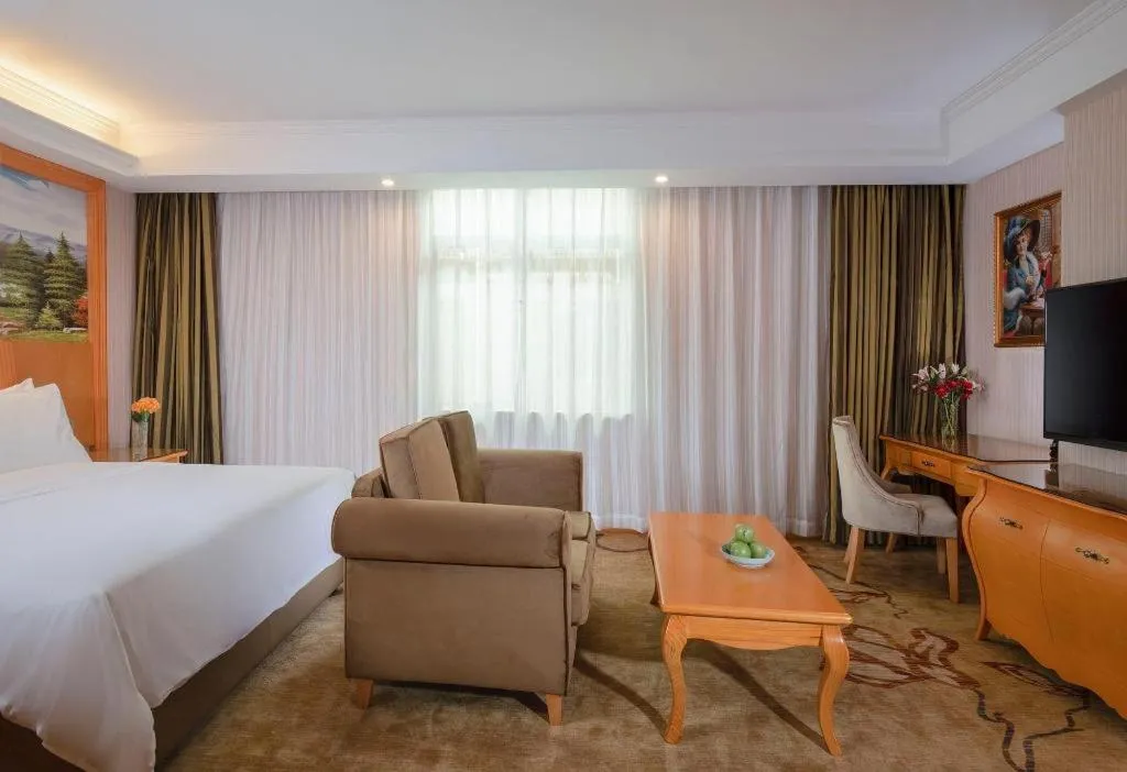 Bed in Vienna Hotel Guangdong Boluo Fu Mountain Scenic Spot