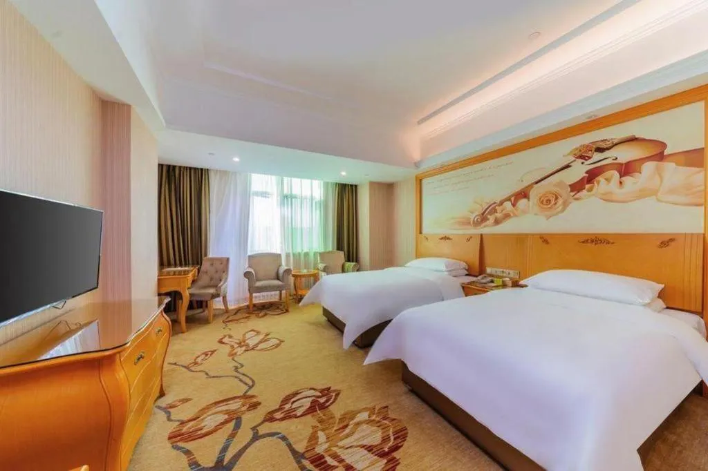 Bed in Vienna Hotel Guangdong Boluo Fu Mountain Scenic Spot