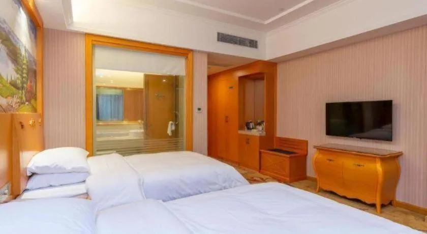 Bed in Vienna Hotel Guangdong Boluo Fu Mountain Scenic Spot