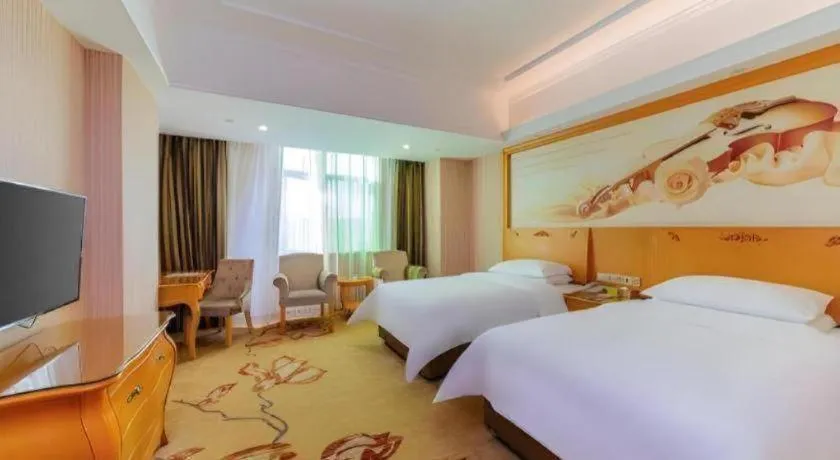 Bed in Vienna Hotel Guangdong Boluo Fu Mountain Scenic Spot