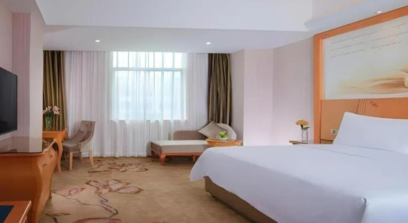 Bed in Vienna Hotel Guangdong Boluo Fu Mountain Scenic Spot