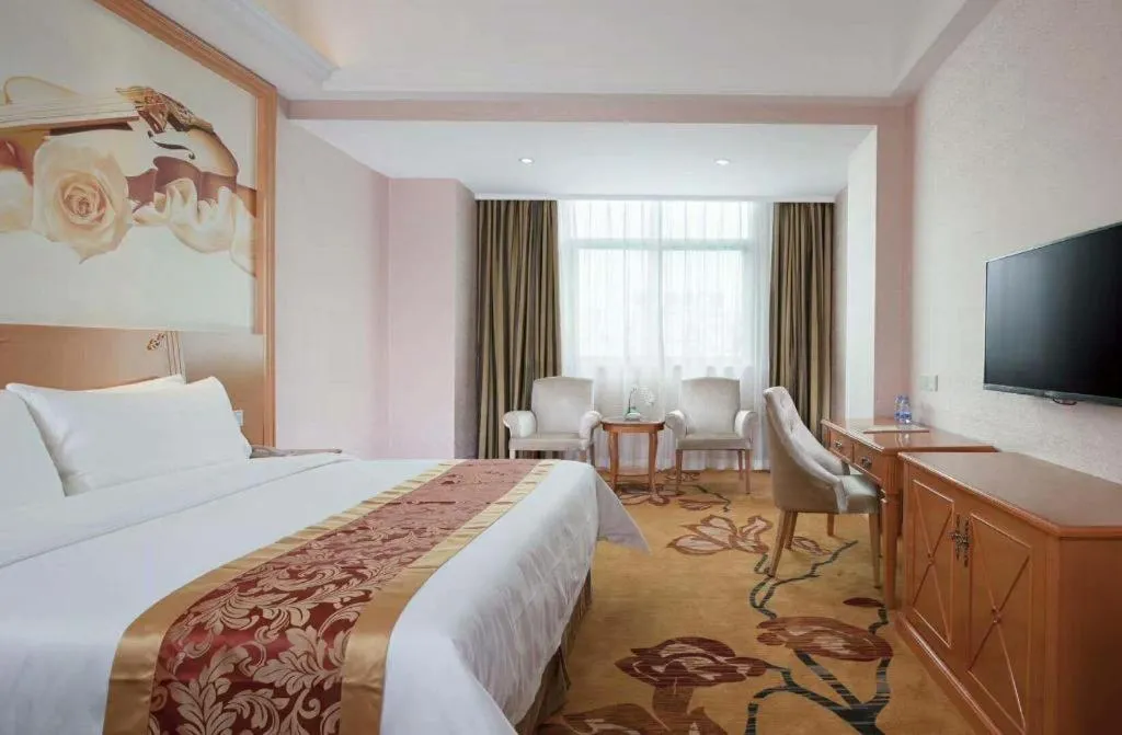 Bed in Vienna Hotel Guangdong Boluo Fu Mountain Scenic Spot