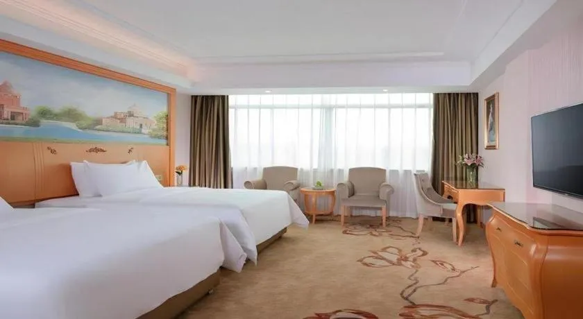 Bed in Vienna Hotel Guangdong Boluo Fu Mountain Scenic Spot