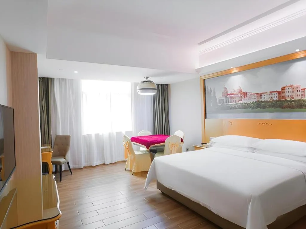 Bed in Vienna Hotel Guangdong Boluo Fu Mountain Scenic Spot