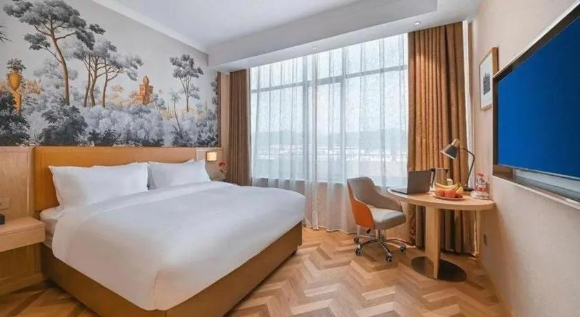 Bed in Vienna Hotel Jiangxi Ganzhou Ningdu Bus Station