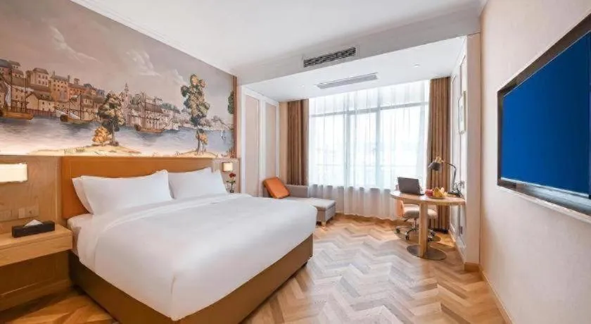 Bed in Vienna Hotel Jiangxi Ganzhou Ningdu Bus Station