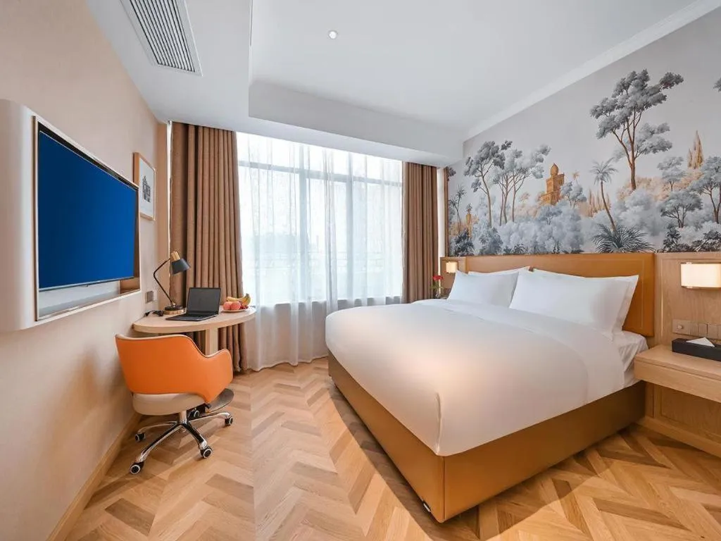 Bed in Vienna Hotel Jiangxi Ganzhou Ningdu Bus Station