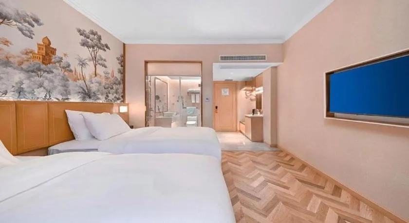 Bed in Vienna Hotel Jiangxi Ganzhou Ningdu Bus Station