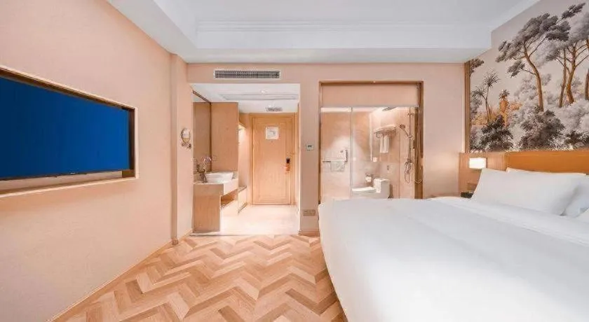 Bed in Vienna Hotel Jiangxi Ganzhou Ningdu Bus Station