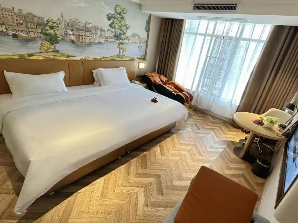 Bed in Vienna Hotel Jiangxi Ganzhou Ningdu Bus Station