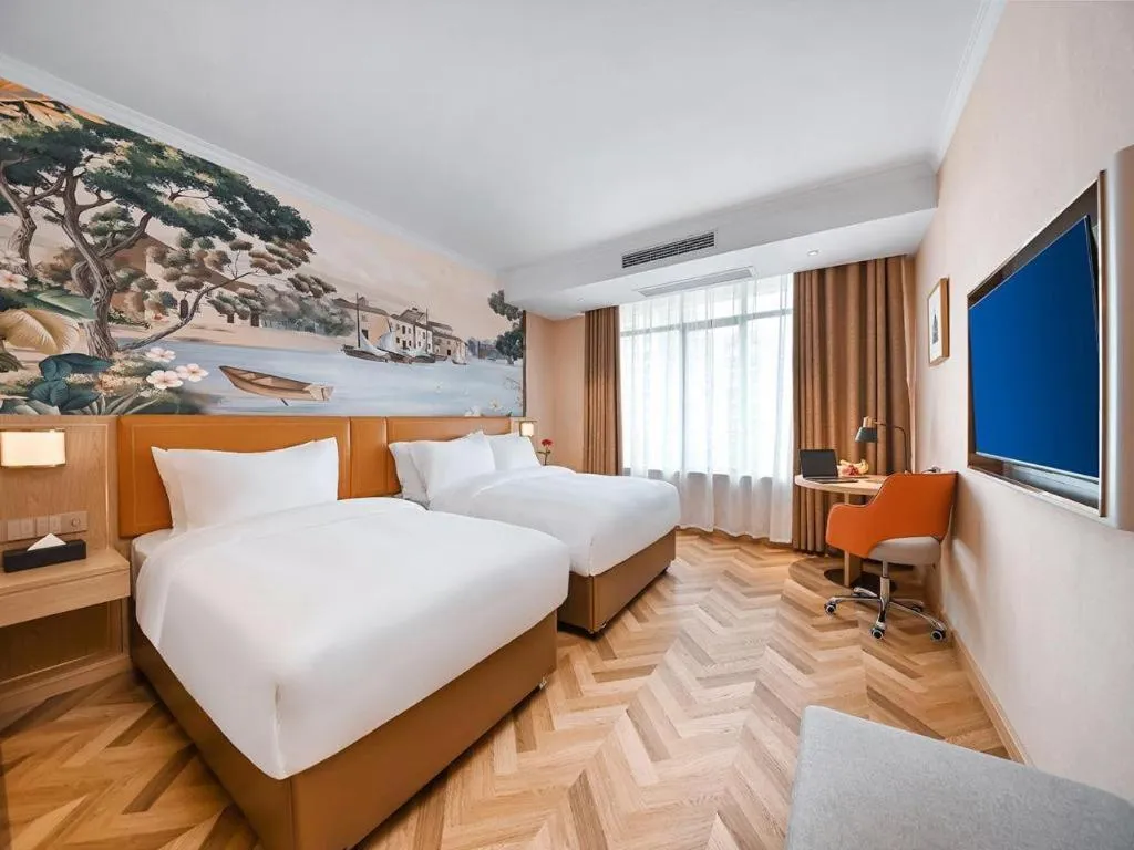 Bed in Vienna Hotel Jiangxi Ganzhou Ningdu Bus Station