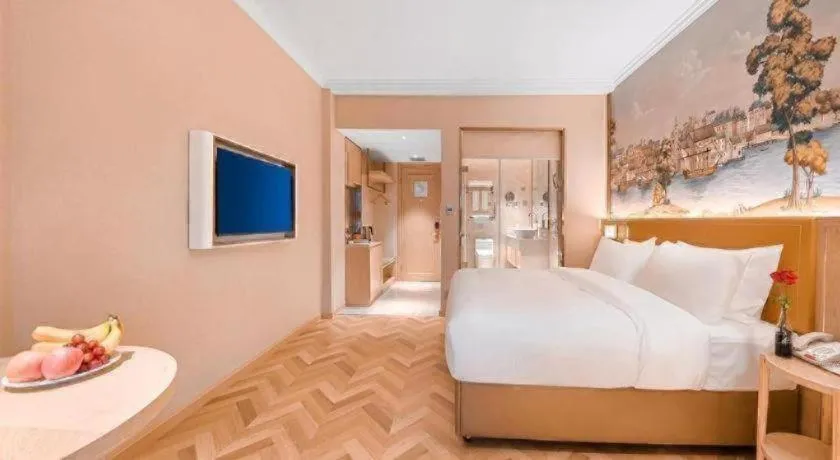 Bed in Vienna Hotel Jiangxi Ganzhou Ningdu Bus Station