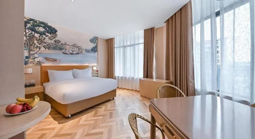 Bed in Vienna Hotel Jiangxi Ganzhou Ningdu Bus Station