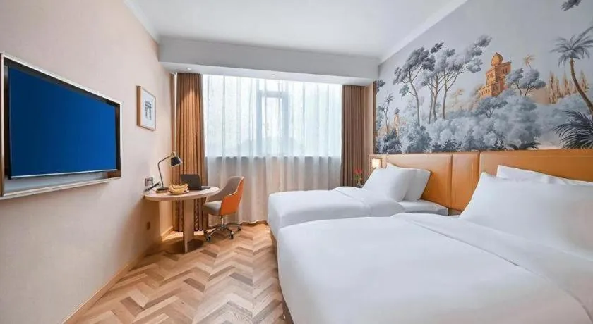 Bed in Vienna Hotel Jiangxi Ganzhou Ningdu Bus Station