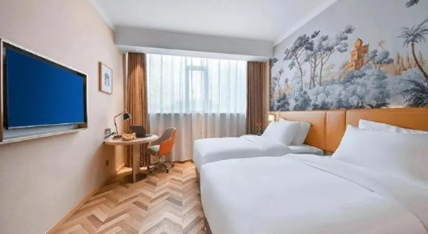 Bed in Vienna Hotel Jiangxi Ganzhou Ningdu Bus Station