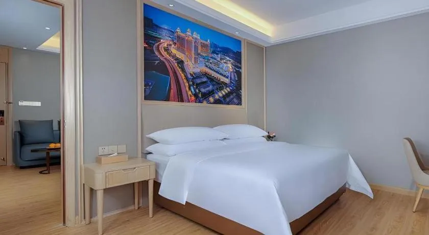 Bed in Vienna Hotel Zhuhai Huafashangdu Nanping Science Industrial Park