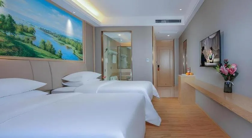 Bed in Vienna Hotel Zhuhai Huafashangdu Nanping Science Industrial Park