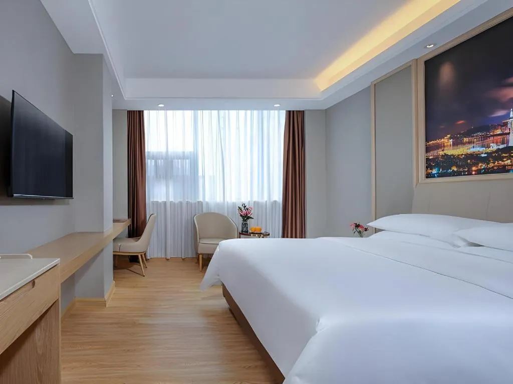 Bed in Vienna Hotel Zhuhai Huafashangdu Nanping Science Industrial Park