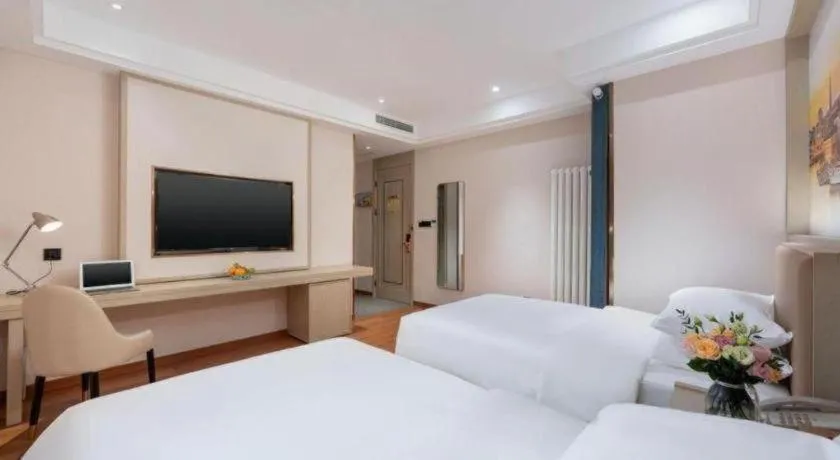 Bed in Vienna Hotel Beijing Changping Metro Station