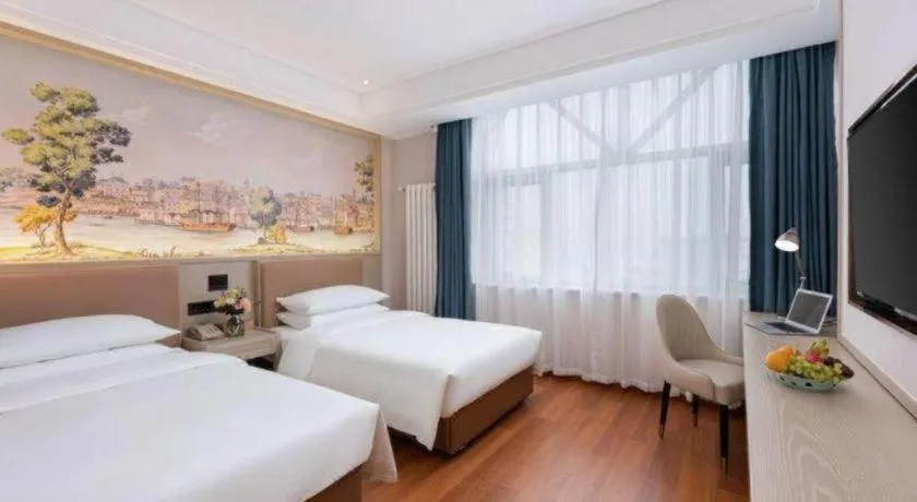 Bed in Vienna Hotel Beijing Changping Metro Station