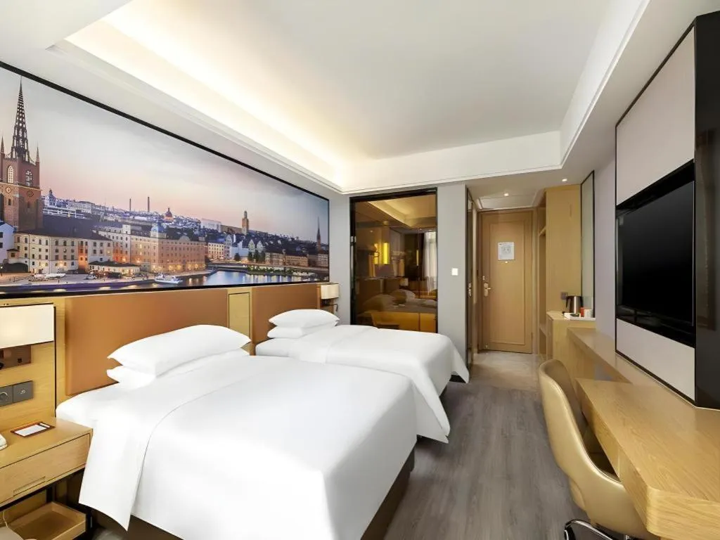 Bed in Vienna Hotel Jiangxi Shangrao High-Speed Railway Station