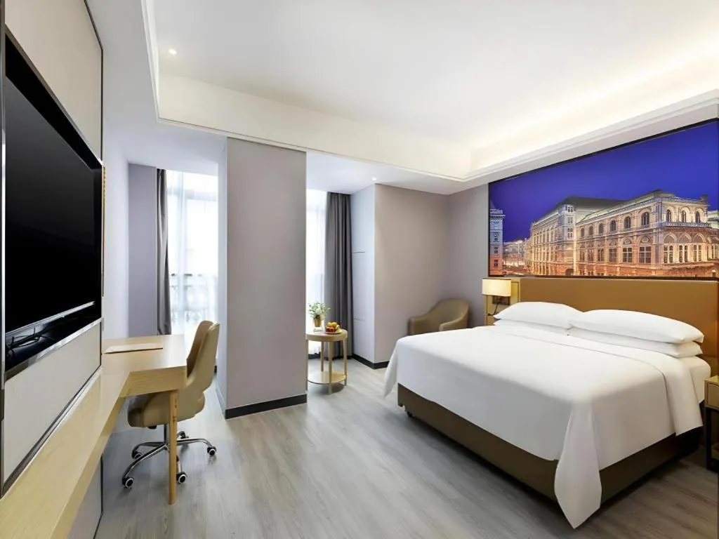 Bed in Vienna Hotel Jiangxi Shangrao High-Speed Railway Station