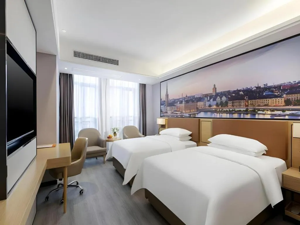 Bed in Vienna Hotel Jiangxi Shangrao High-Speed Railway Station