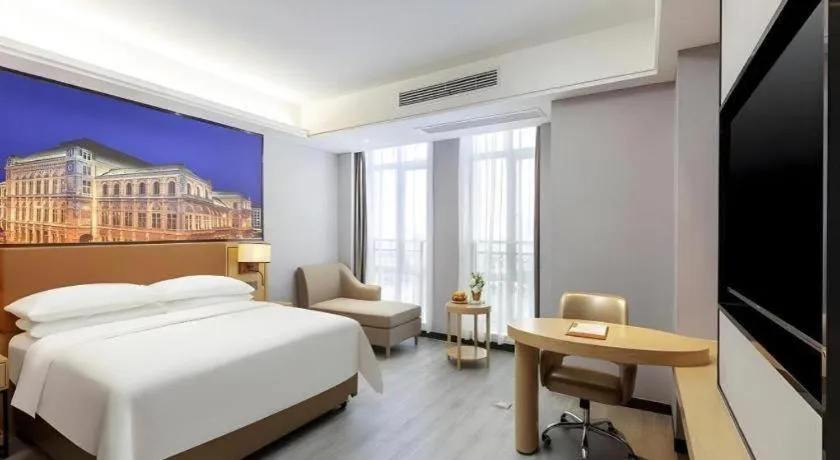 Bed in Vienna Hotel Jiangxi Shangrao High-Speed Railway Station