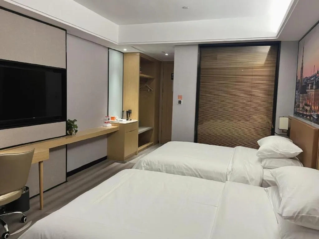 Bed in Vienna Hotel Jiangxi Shangrao High-Speed Railway Station