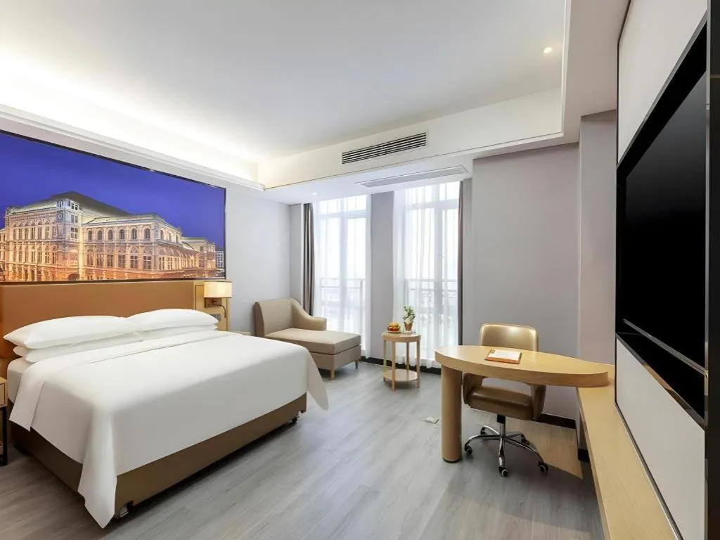 Bed in Vienna Hotel Jiangxi Shangrao High-Speed Railway Station
