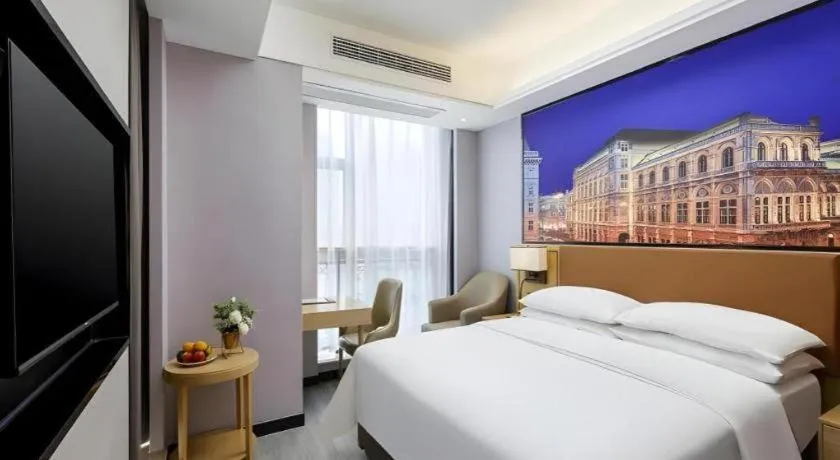 Bed in Vienna Hotel Jiangxi Shangrao High-Speed Railway Station