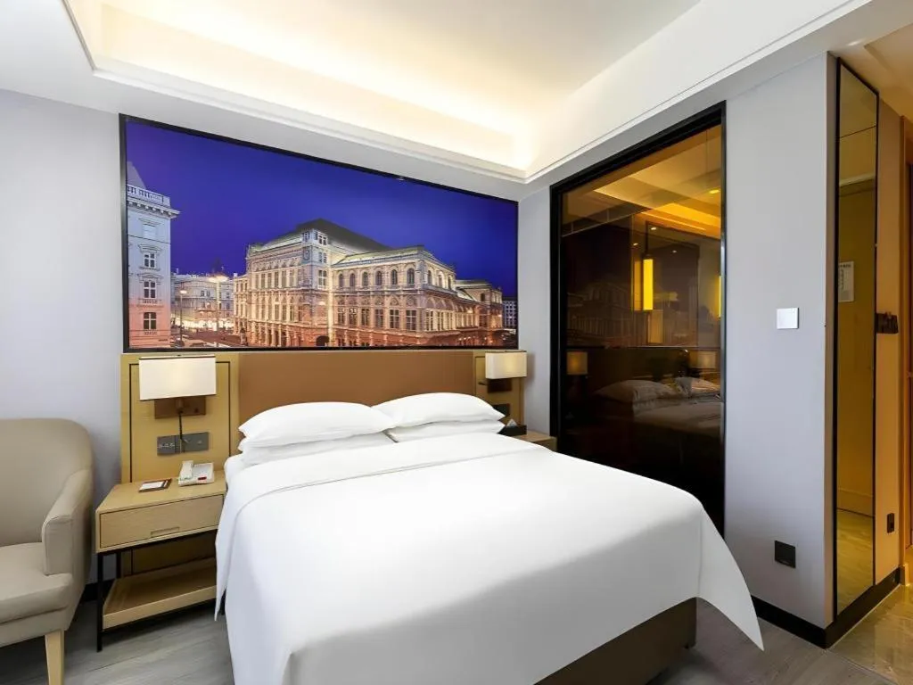 Bed in Vienna Hotel Jiangxi Shangrao High-Speed Railway Station