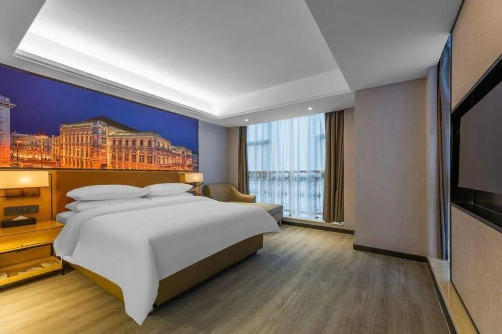 Bed in Vienna Hotel Jiangxi Shangrao High-Speed Railway Station