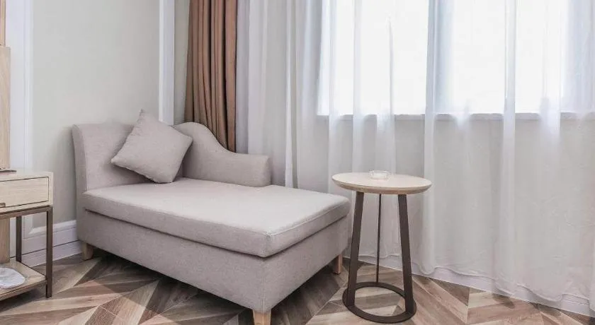 Bed in Vienna Hotel Sichuan Hejiang Yangtze River Bridge