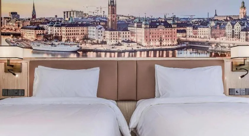Bed in Vienna Hotel Sichuan Hejiang Yangtze River Bridge