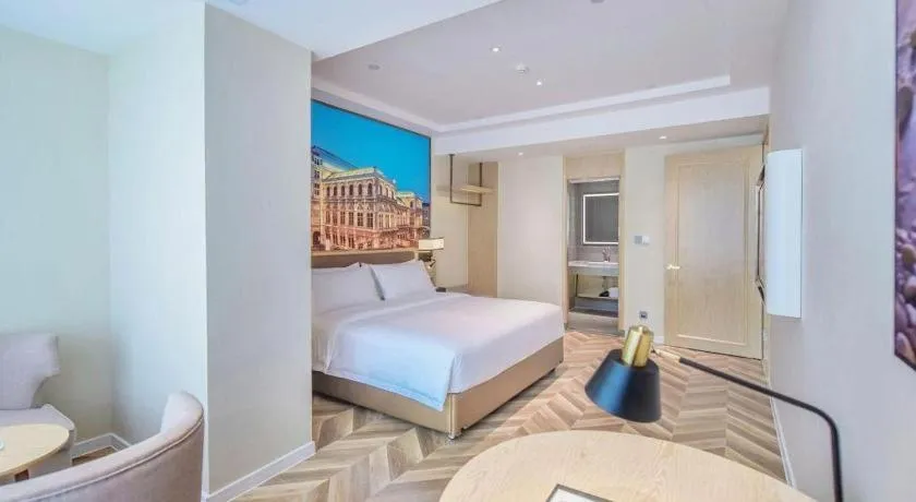 Bed in Vienna Hotel Sichuan Hejiang Yangtze River Bridge