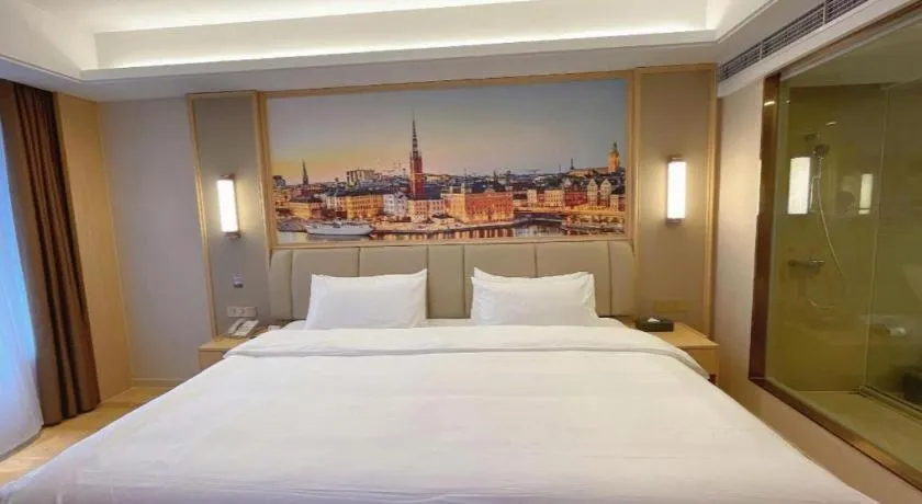 Bed in Vienna Hotel Sichuan Hejiang Yangtze River Bridge