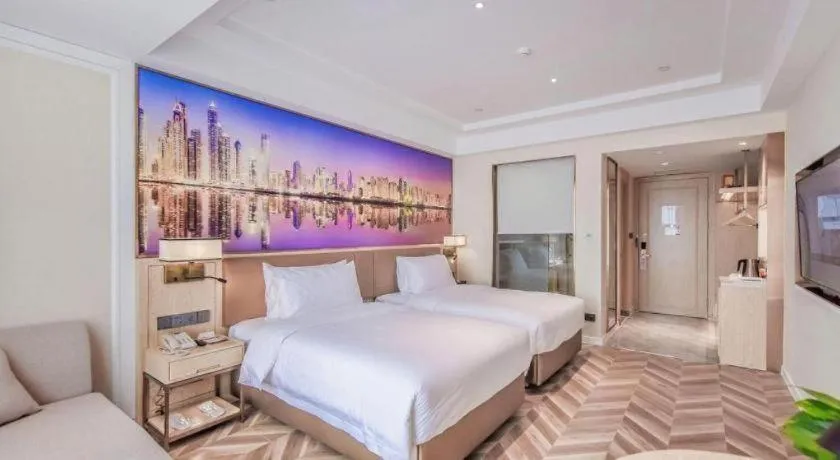 Bed in Vienna Hotel Sichuan Hejiang Yangtze River Bridge