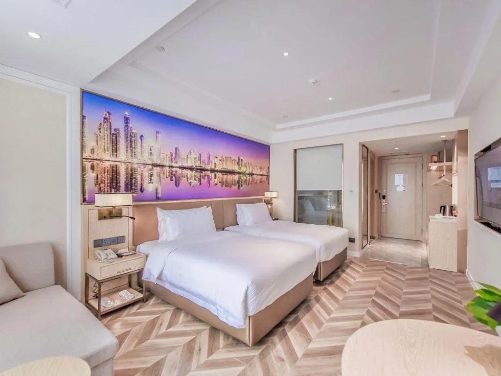 Bed in Vienna Hotel Sichuan Hejiang Yangtze River Bridge