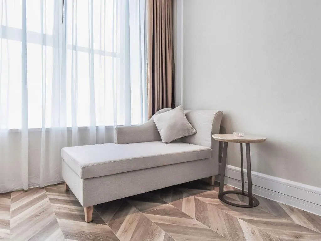 Bed in Vienna Hotel Sichuan Hejiang Yangtze River Bridge