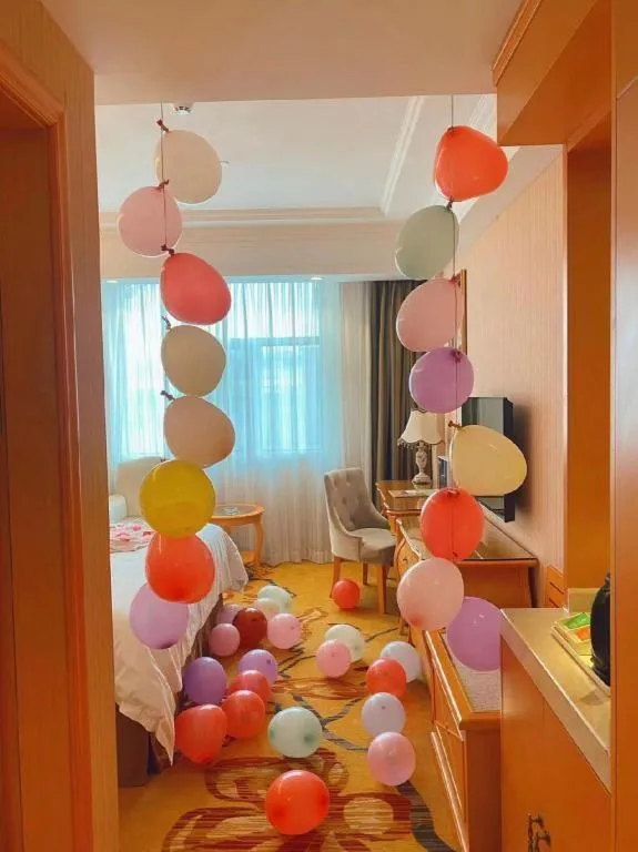 Bed in Vienna Hotel Guangxi Beiliu Passenger Station