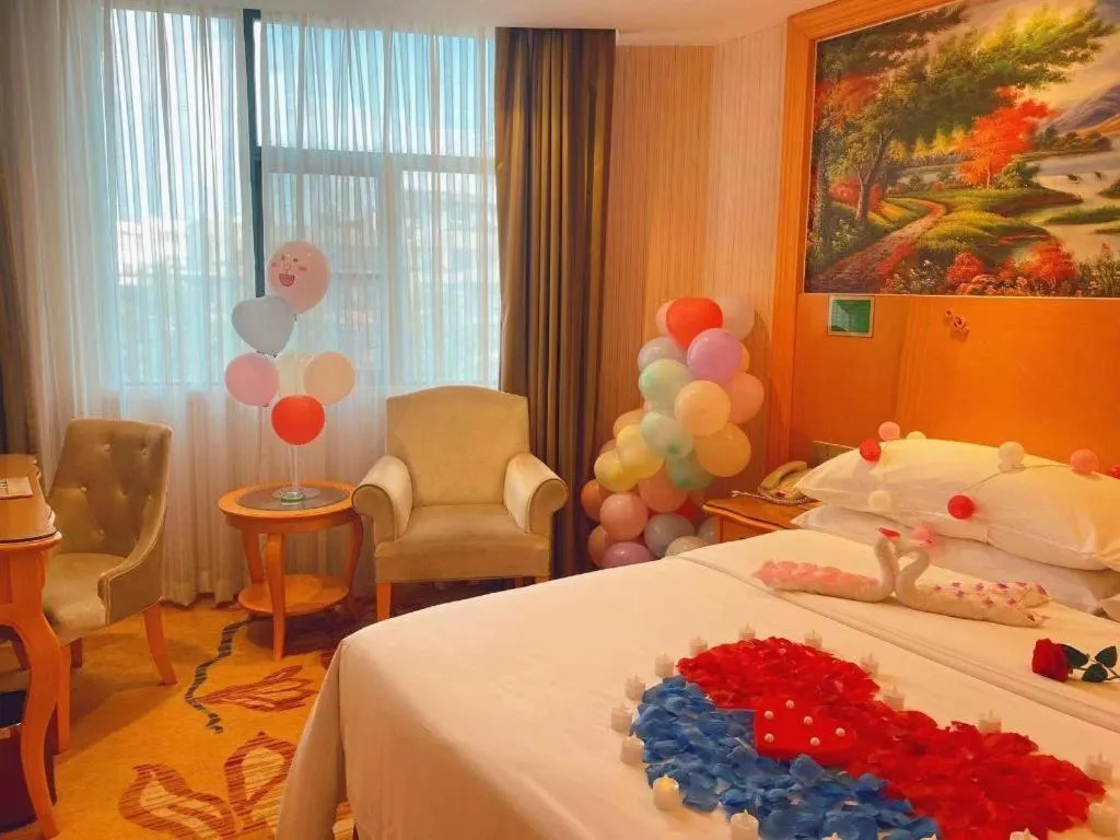 Bed in Vienna Hotel Guangxi Beiliu Passenger Station