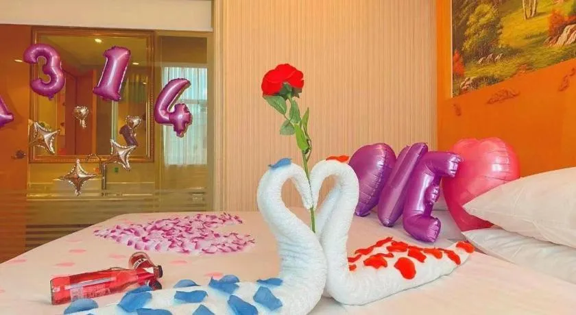 Bed in Vienna Hotel Guangxi Beiliu Passenger Station