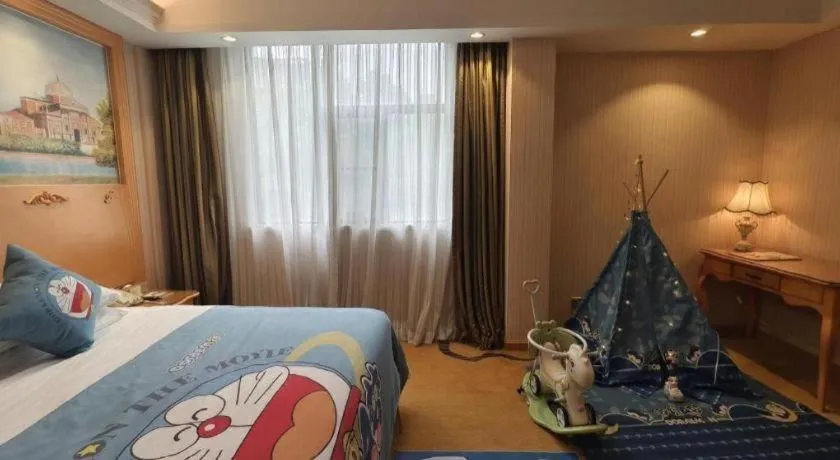 Bed in Vienna Hotel Guangxi Beiliu Passenger Station