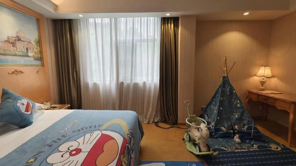 Bed in Vienna Hotel Guangxi Beiliu Passenger Station