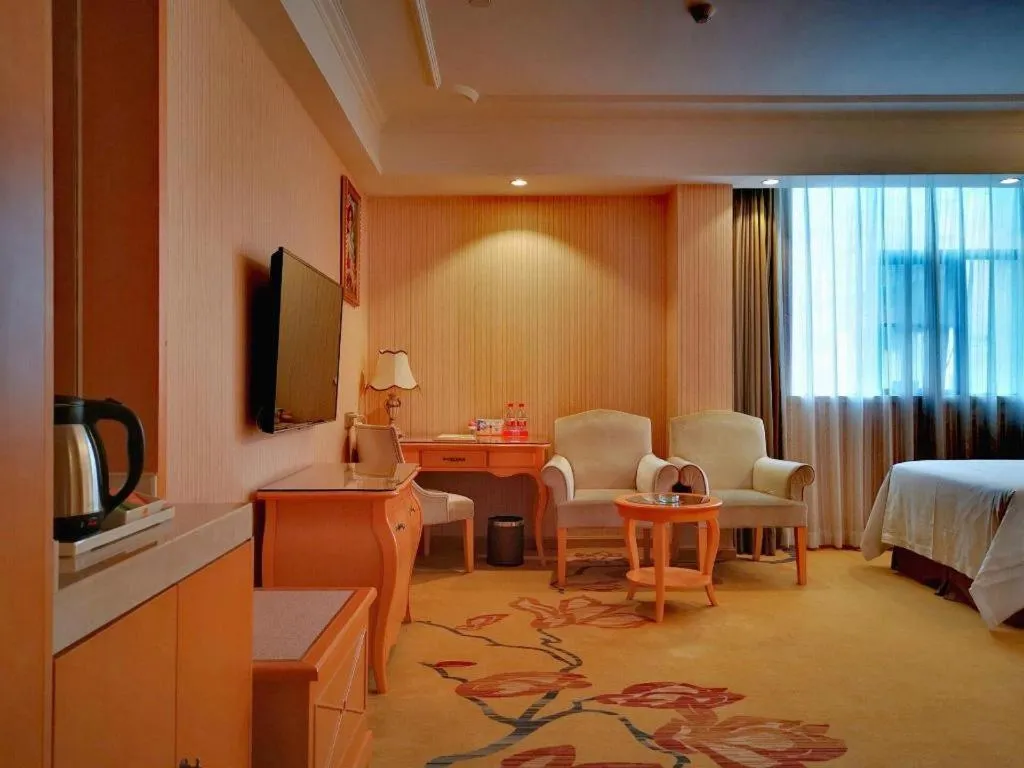 Bed in Vienna Hotel Guangxi Beiliu Passenger Station