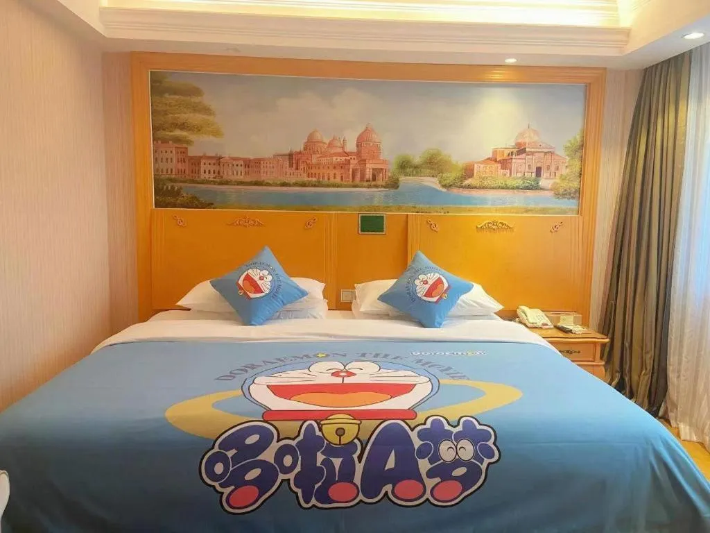 Bed in Vienna Hotel Guangxi Beiliu Passenger Station